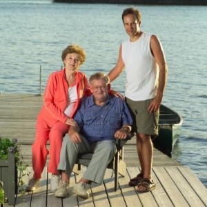 254869-parents-posing-with-their-adult-son