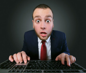 funny young man with computer